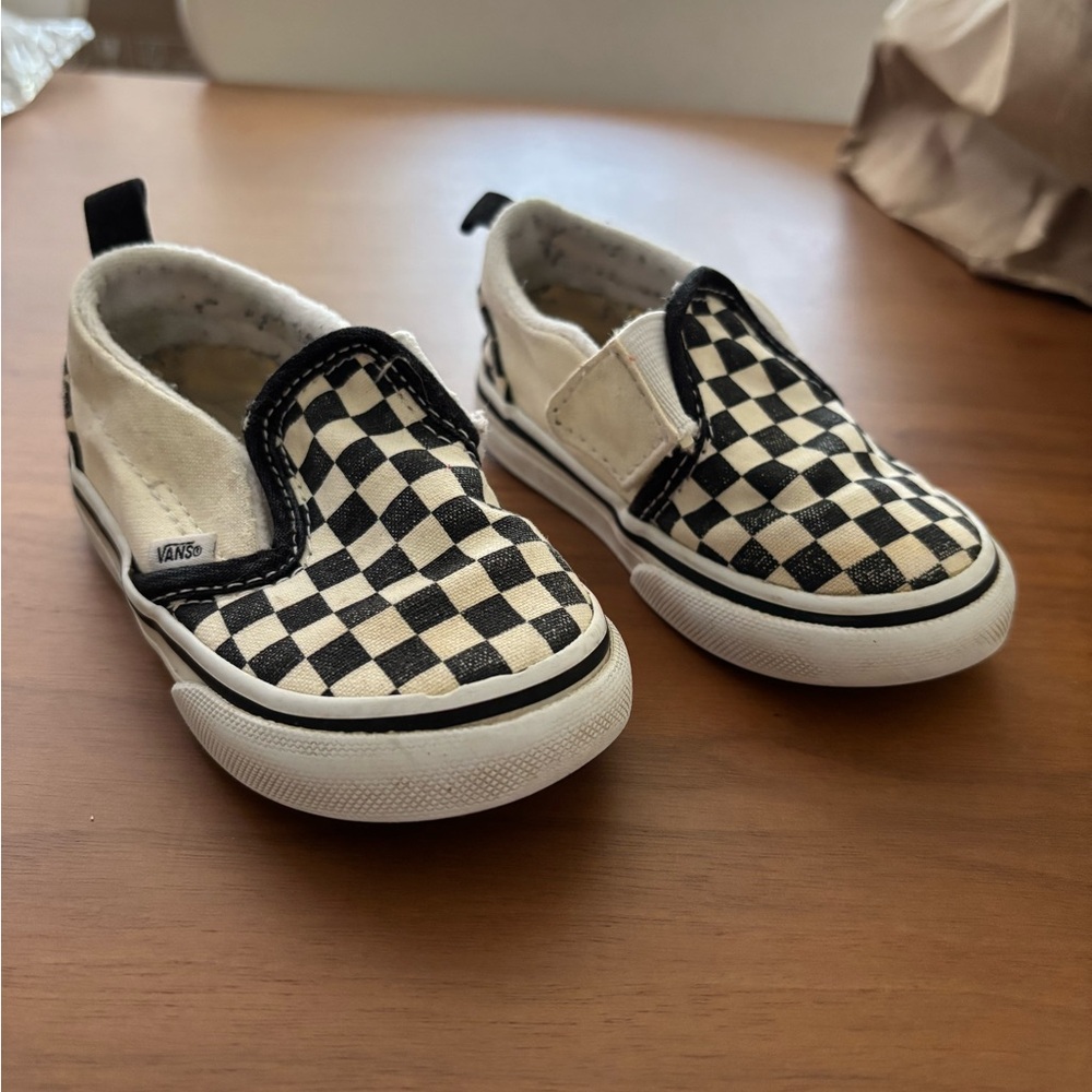 Vans Black and White Checkerboard Slip-On Sneakers